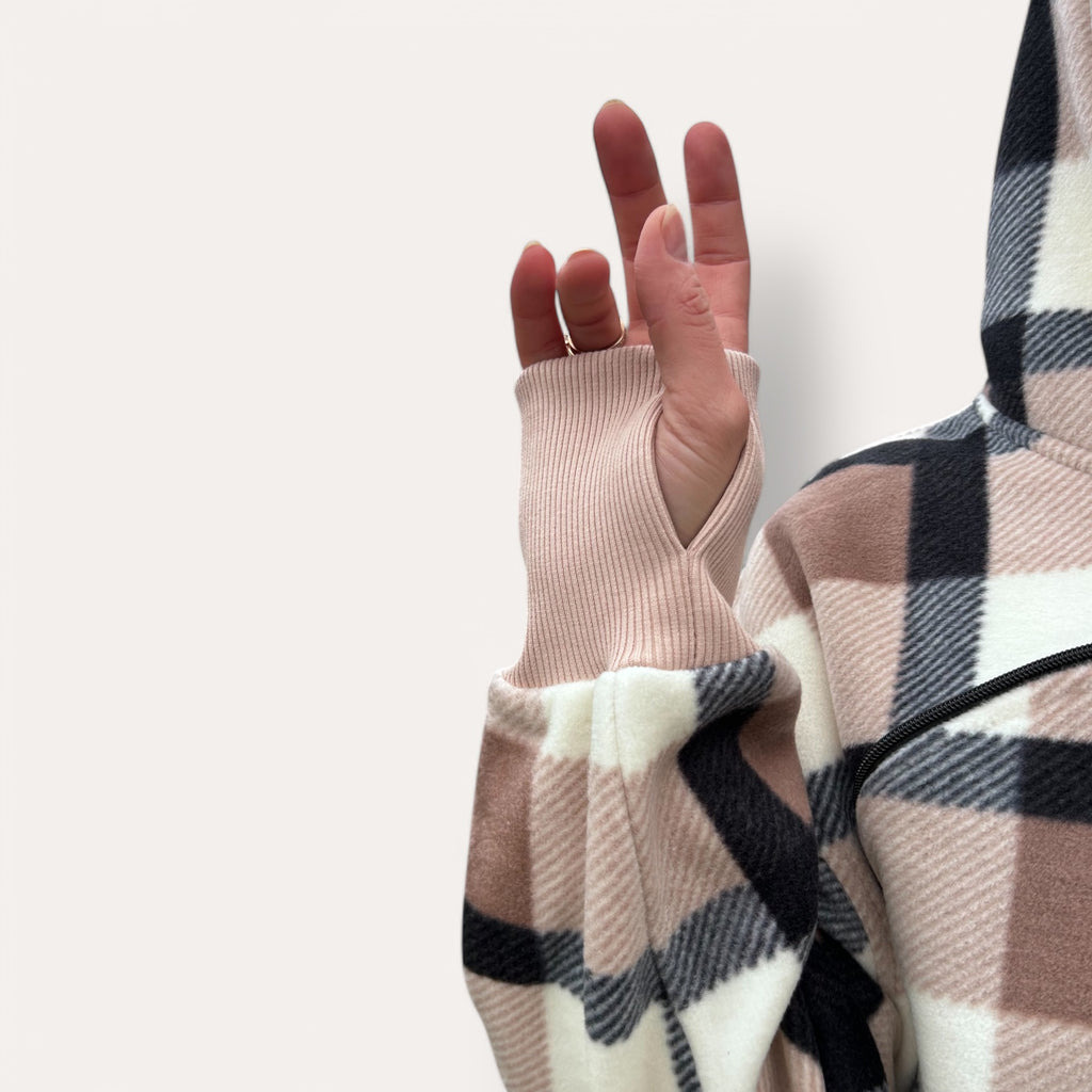 Beige Plaid patterned glove with a plain background
