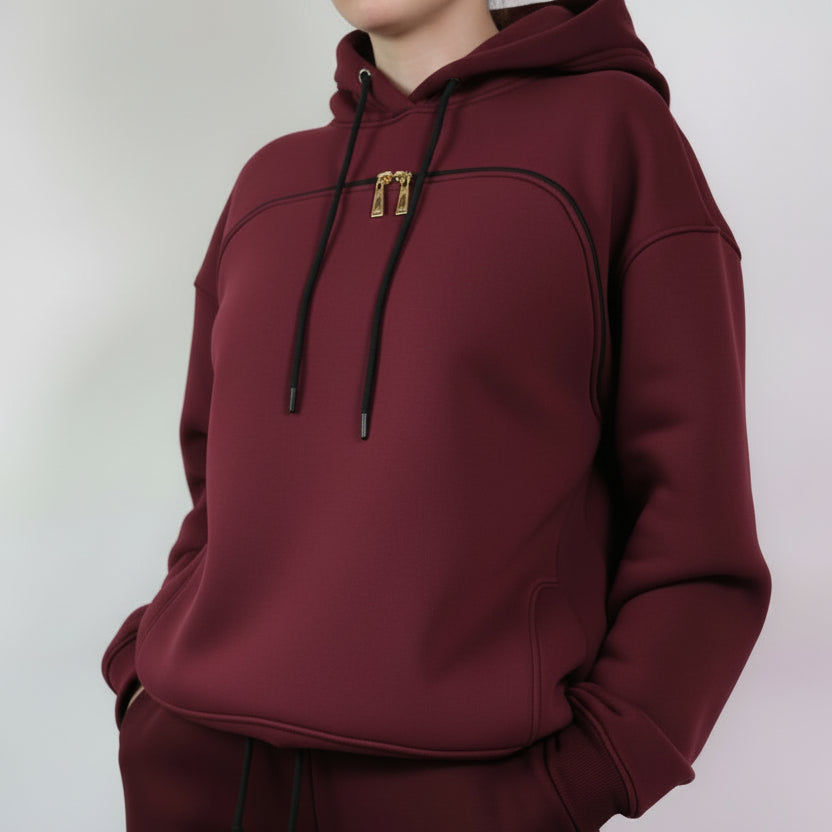 Burgundy hoodie & pants worn by a person against a plain background