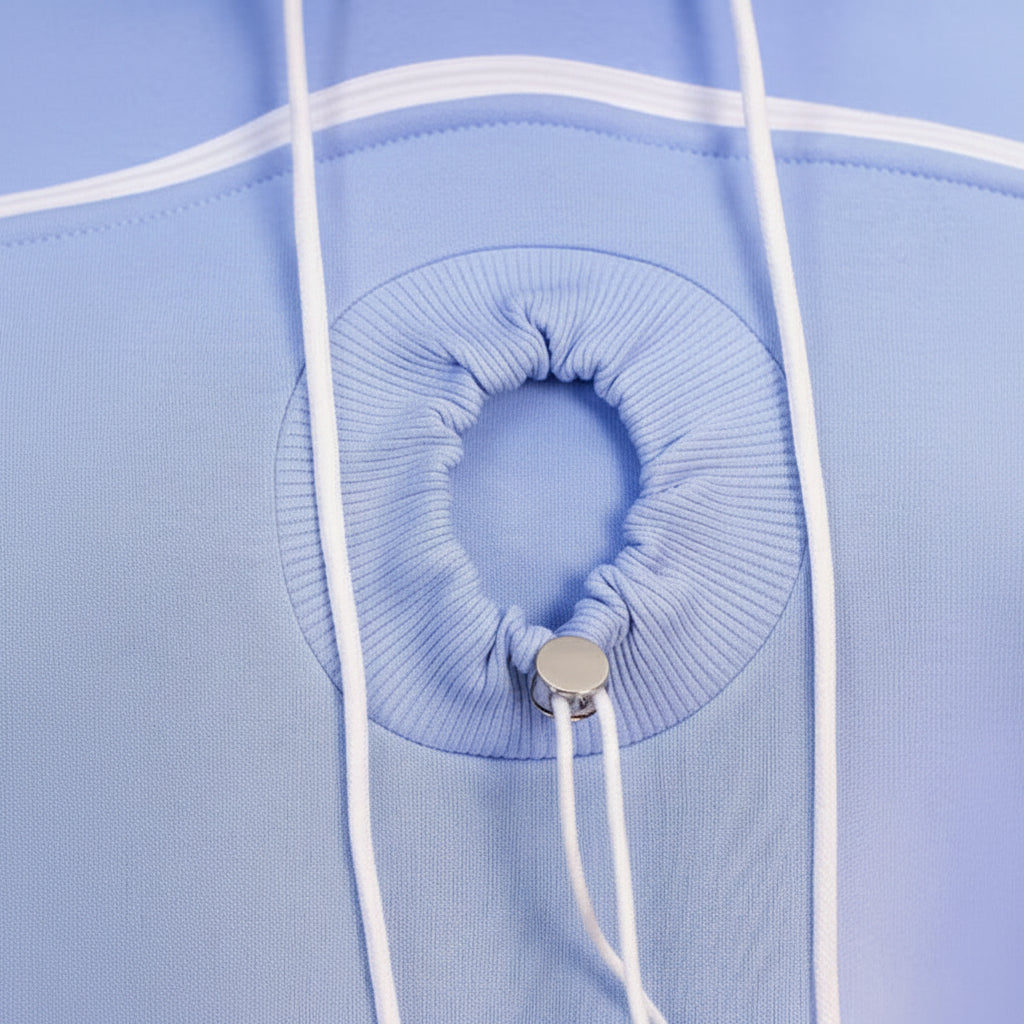 Light blue hoodie with white drawstrings and a circular design on the chest.