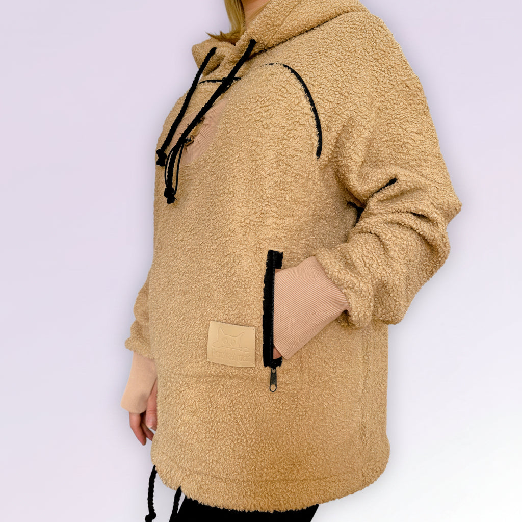 beige boucle fleece jacket with black drawstrings on a white background