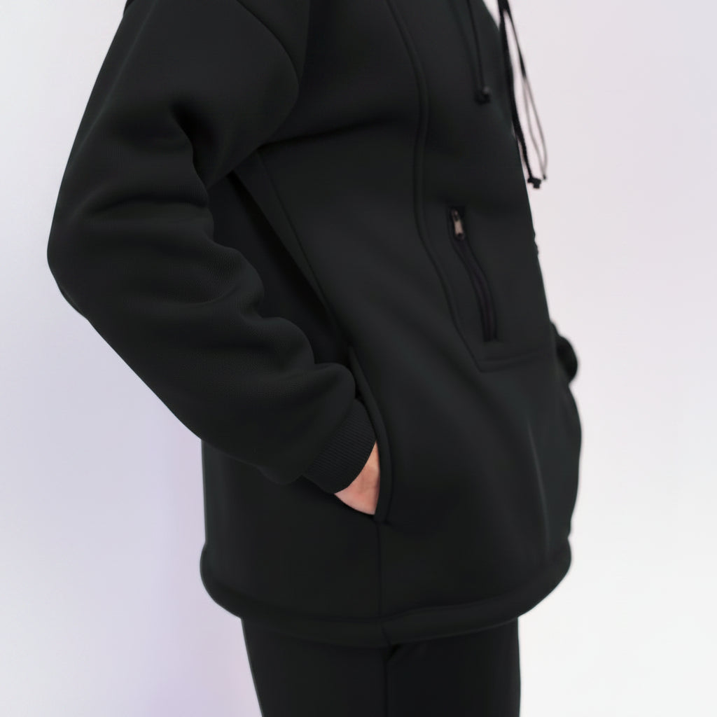 Person wearing a black hoodie 
