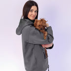 Women wearing a gray hoodie with a dog 