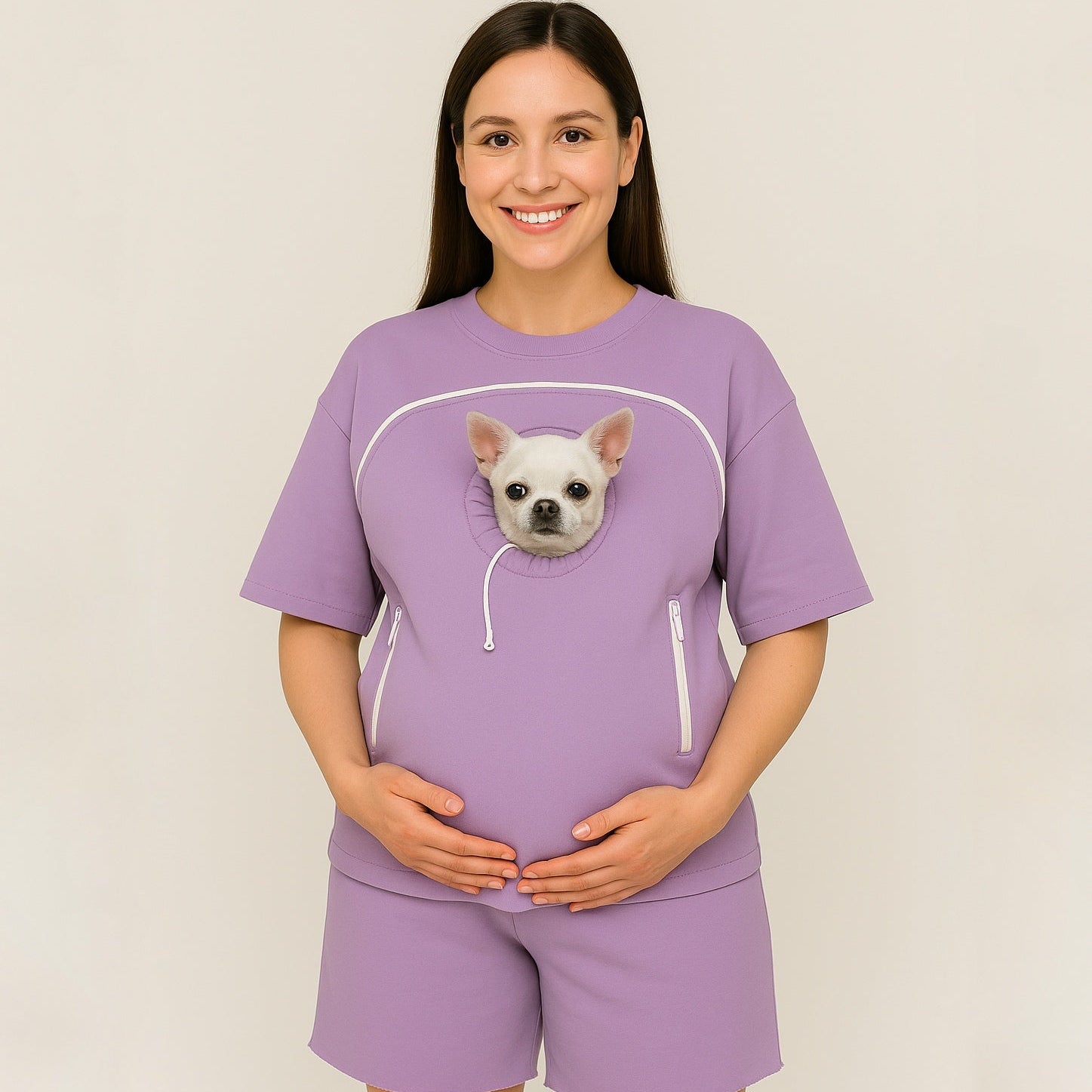 Woman wearing a purple outfit with a dog graphic on a plain background