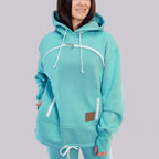Person wearing a turquoise hoodie with white drawstrings on a white background