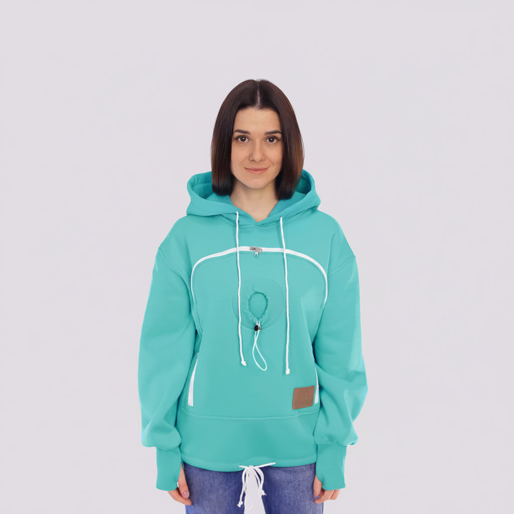 Person wearing a Mint Green hoodie with a white drawstring on a white background