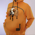 Mustard hoodie with a dog face design on a white background