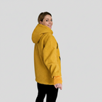 Person wearing a Orange hoodie on a white background