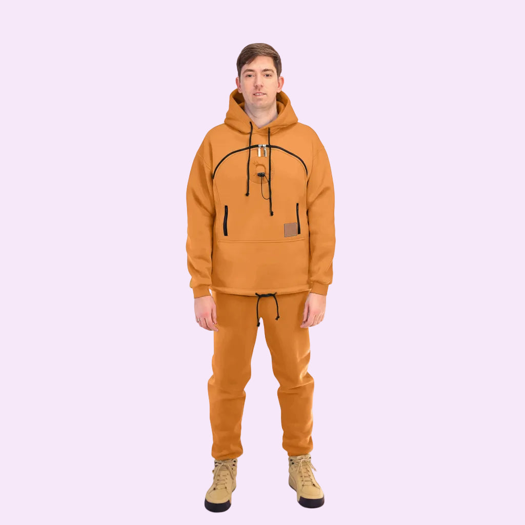Men wearing a orange yellow hoodie and pants on a white background