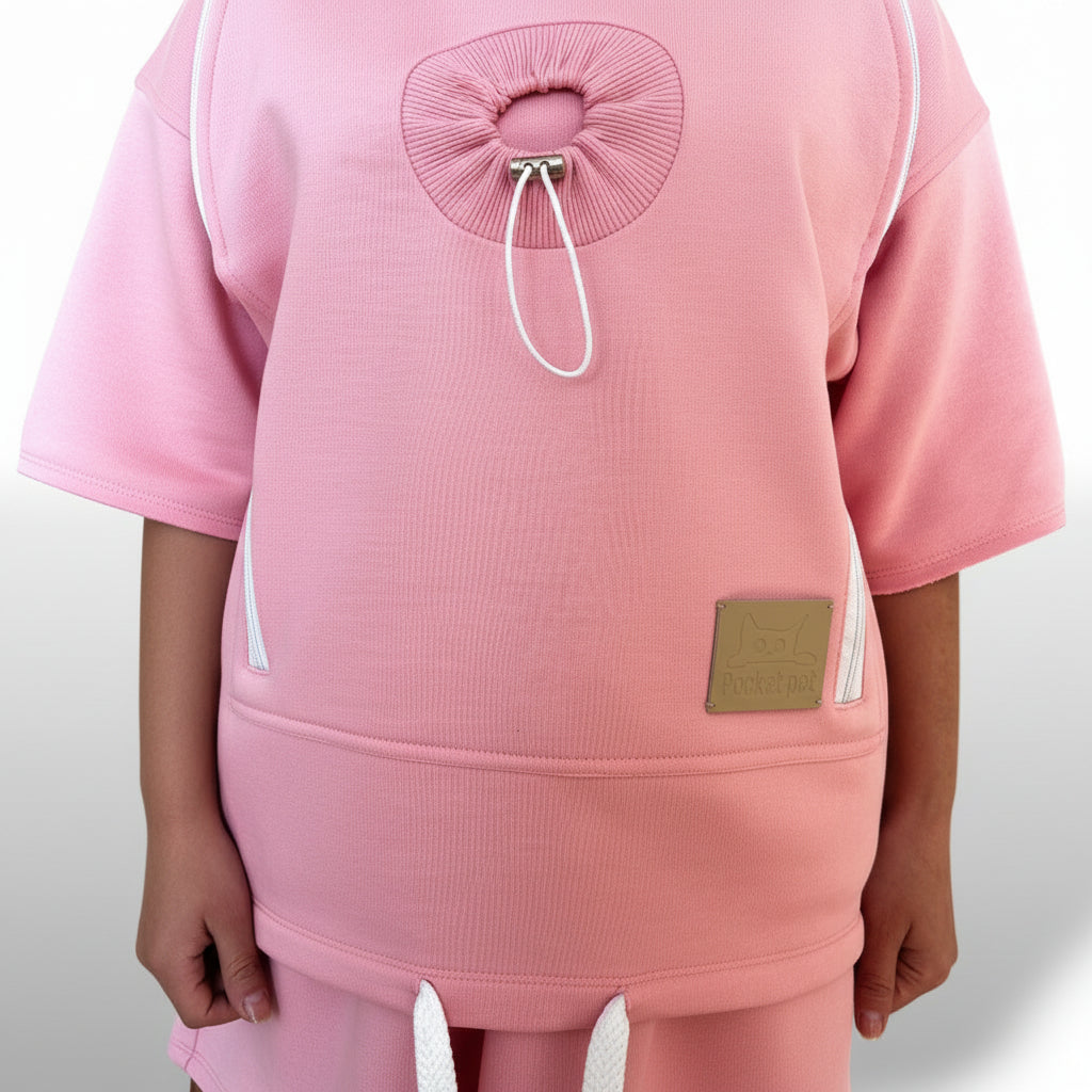 Pink outfit with a unique design on the back against a white background