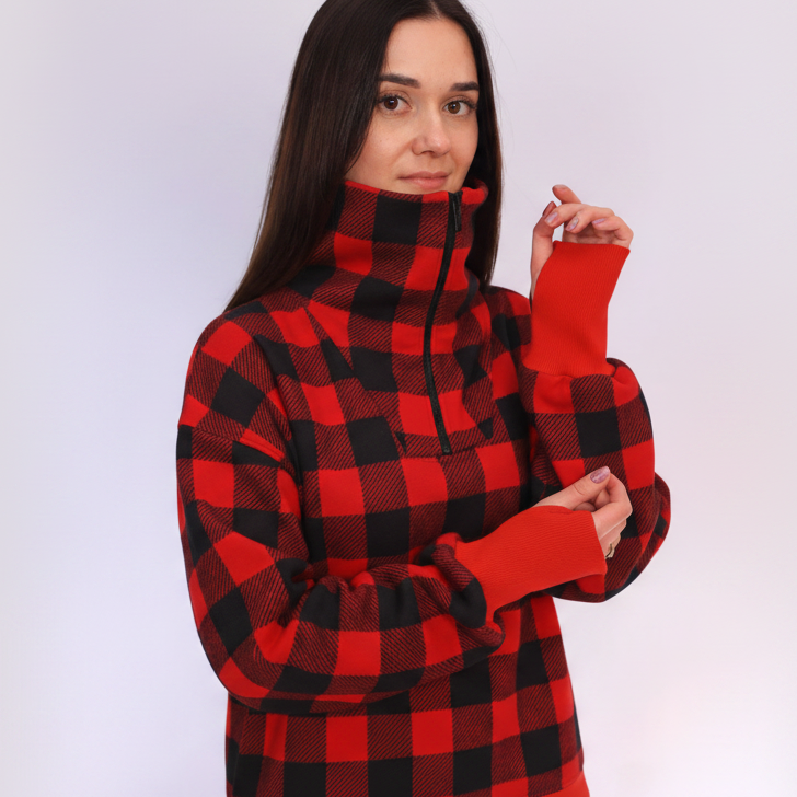 Women wearing a red square plaid sweatshirt with collar on white background